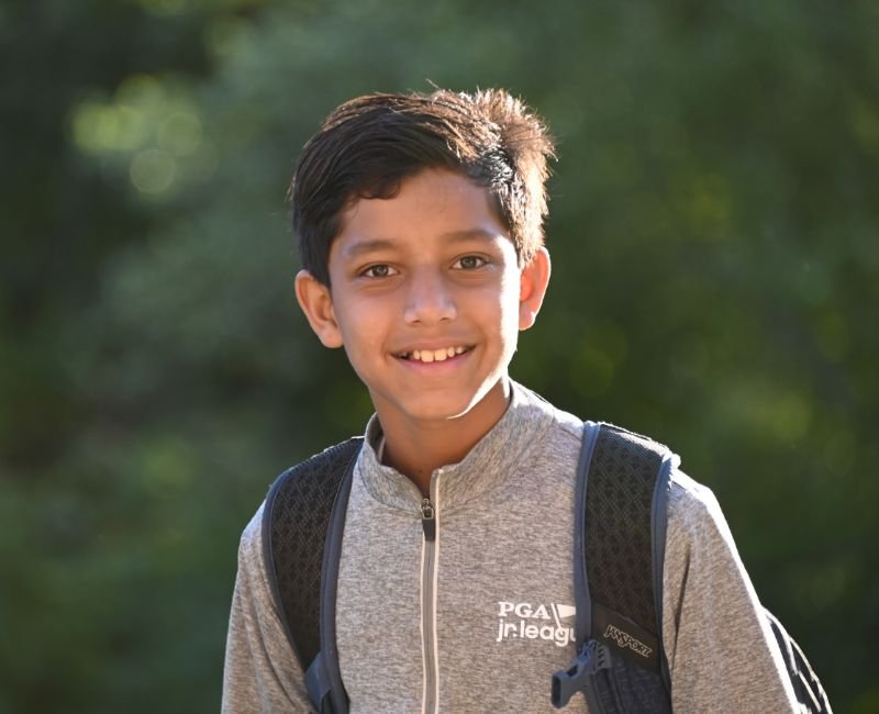 student outside wearing backpack